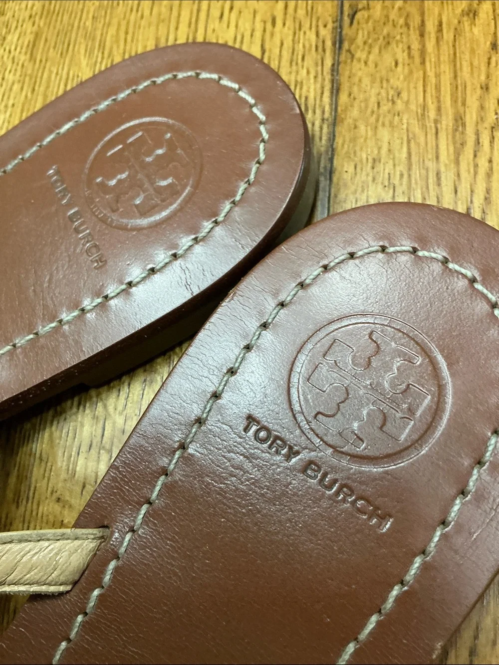 Woman’s Tory Burch tan patent leather thong sandal. Size 9.5. Leather. Like new!